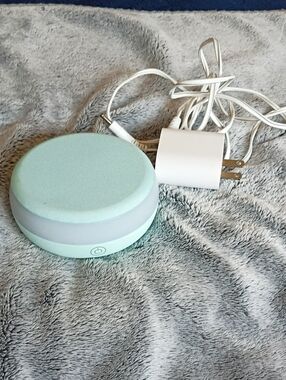 Onn Running Wireless Charger Pad in Mint & Has A Night Light On Pad.
